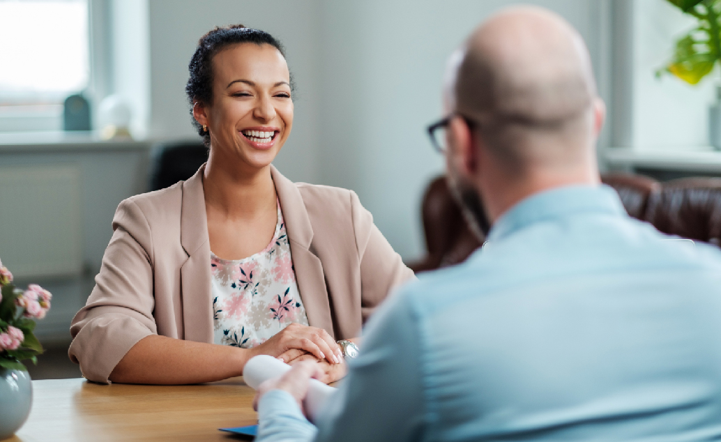 Smiling nurse smiles at her interviewer