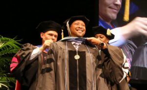 Male ACE graduate at Commencement