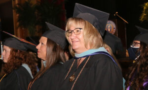 Image of MBA graduate at American College of Education commencement ceremony