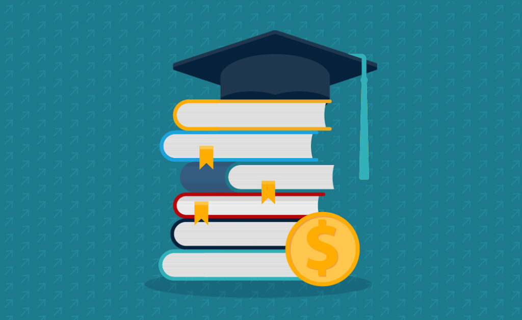 Image of graduation cap sitting on a stack of books