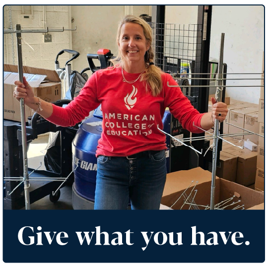 Young women donating clothing at a clothes donation facility.