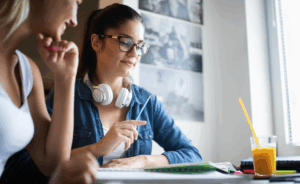 Image of a teacher helping a student