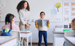 Image of ELL student presenting a project in class