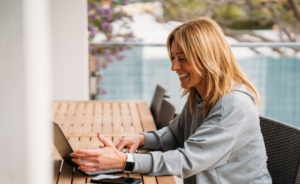 image of teacher working on a laptop
