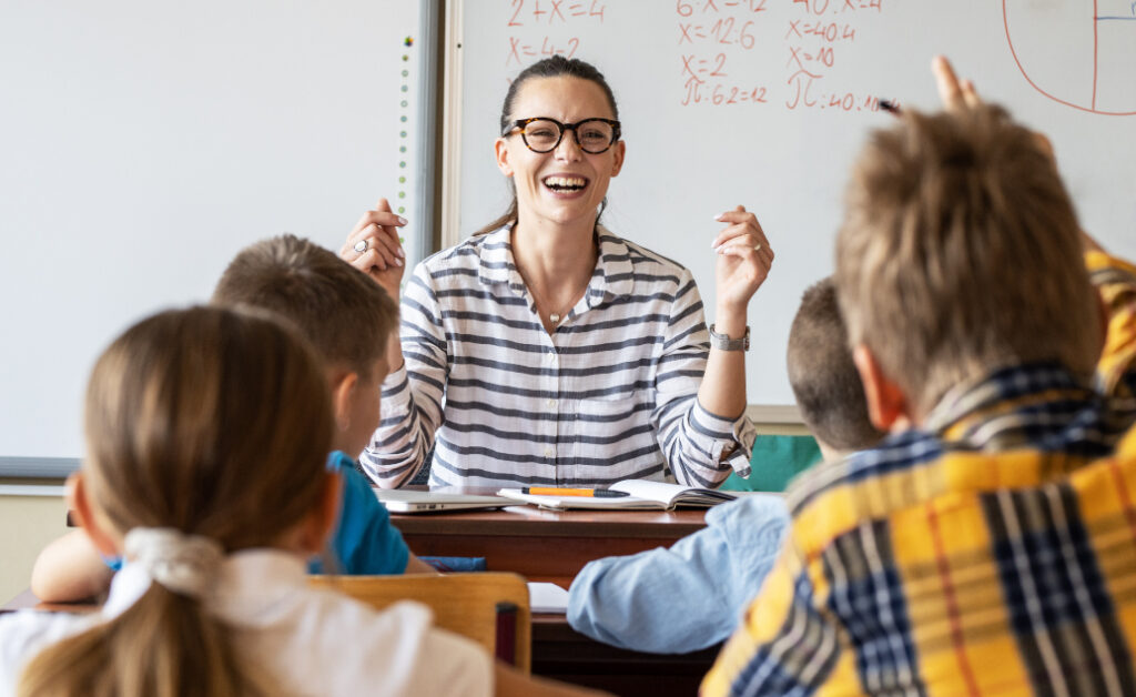 A teacher and her students during a class