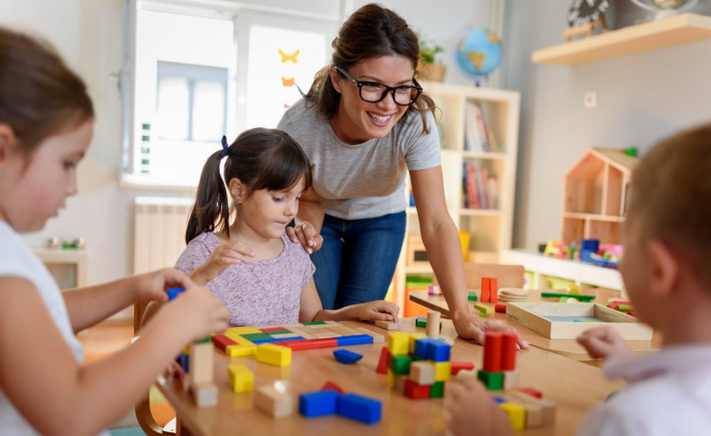 An education paraprofessional with assisting her students